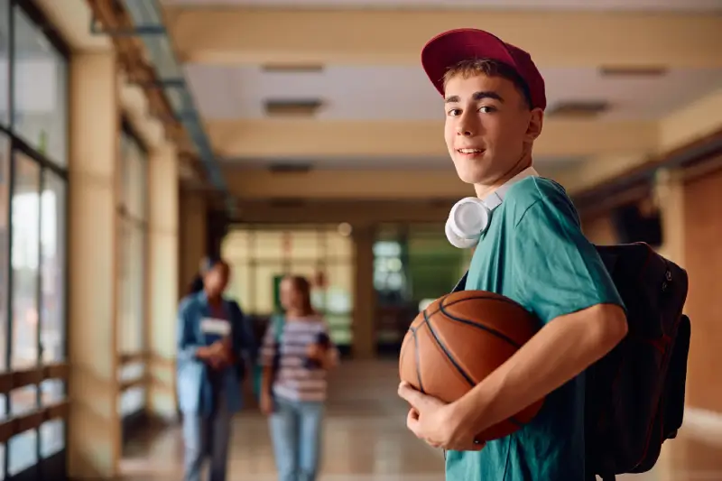 Student athlete managing academics and basketball